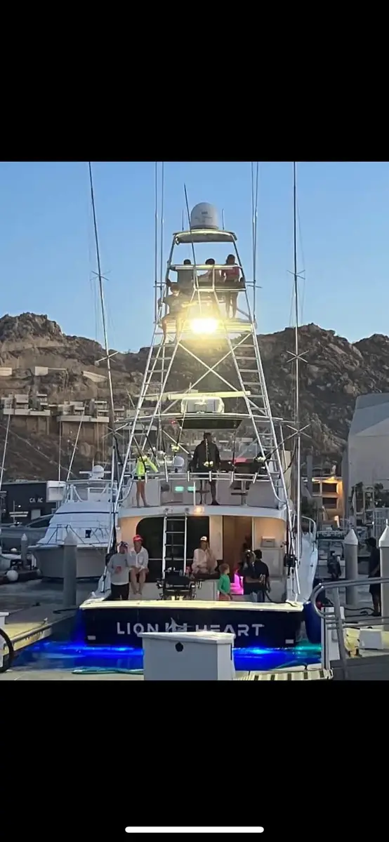 Dusk at the marina with underwater lighting